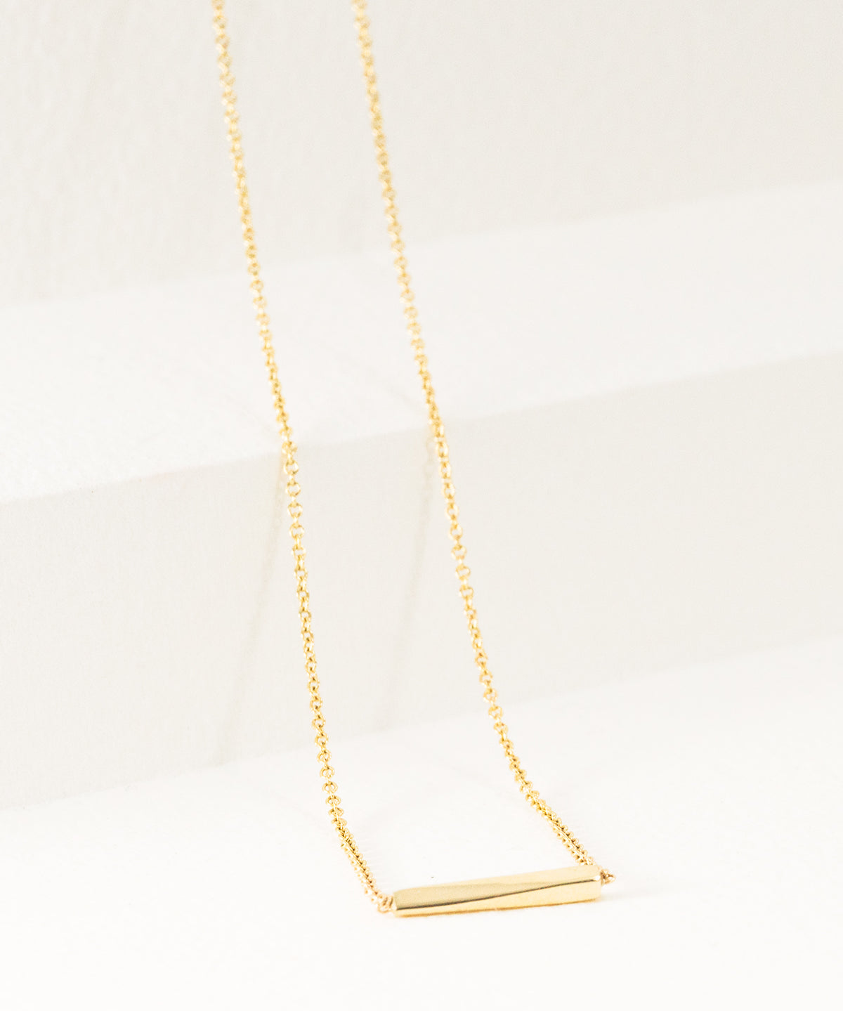 KLOSS_Interval_Bar_Necklace_Pedestal_Crop.jpg